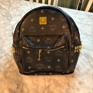 MCM Black Backpack with Gold Accents